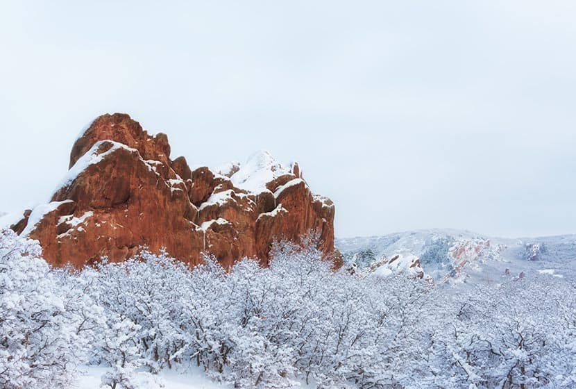 red rocks and snow along hiking trail at roxborough state park in colorado winter hikes near denver