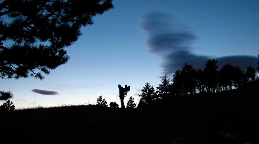 hiking near sundown with dog and baby at mount falcon hike near denver