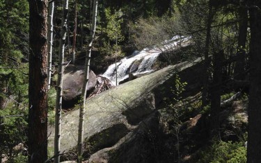buffalo creek waterfall at wellington lake slide waterfall cascading over granite slab on hike near denver