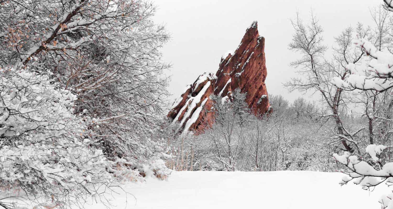 red rock tower in snow at roxborough state park in colorado best winter hikes near denver