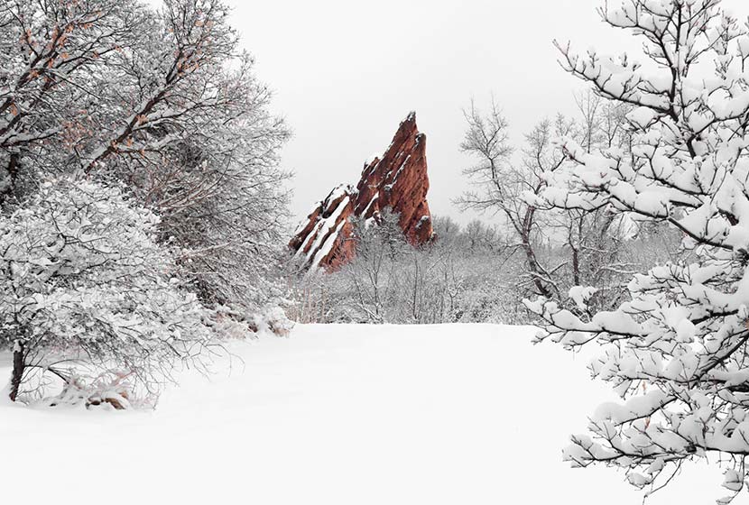 red rock formation in snow at roxborough state park colorado winter hike