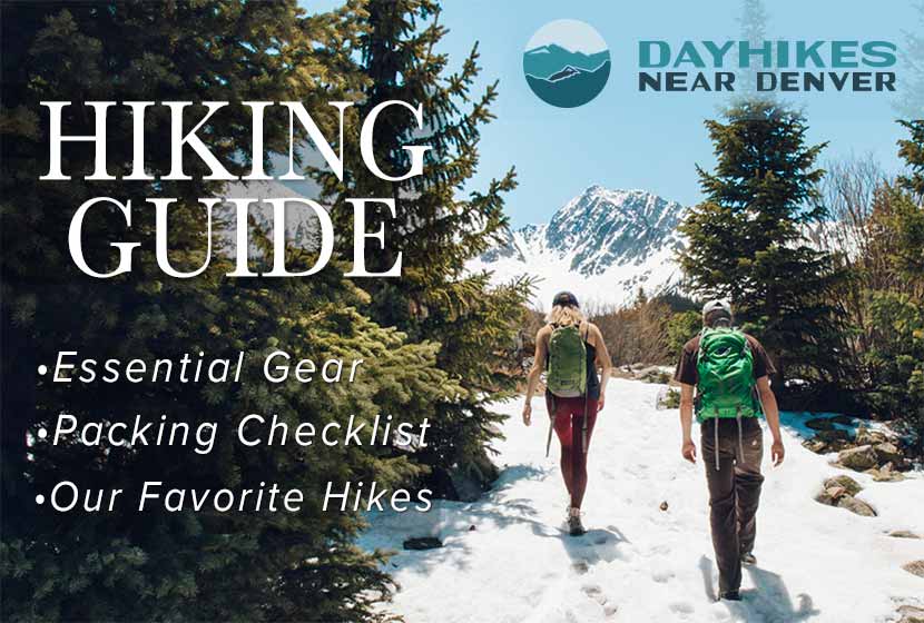 hikers in snow with evergreen trees in foreground and snowcapped mountains in background this is the cover of a hiking guide