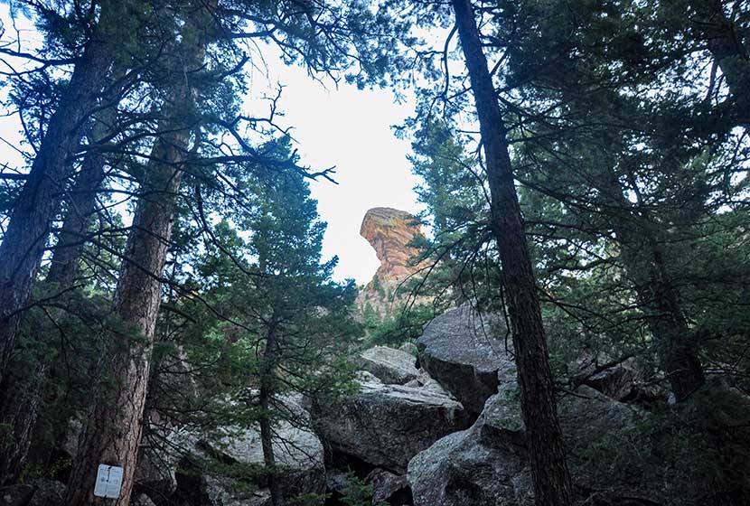 devils thumb along shadow canyon trail with closure sign at bottom left of photo