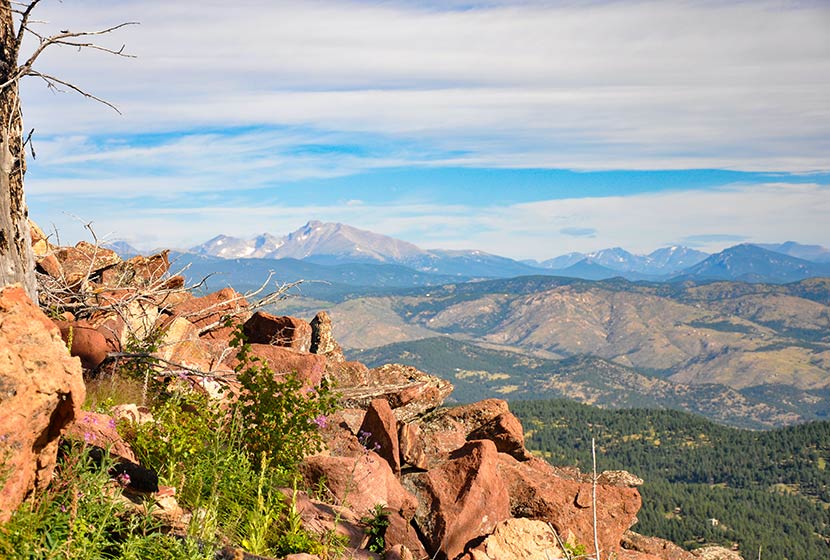 view along approach to south boulder peak summit to the Northwest with Longs Peak mountain in distance