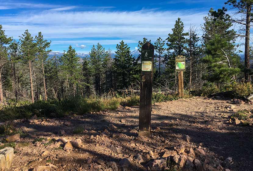 sign for trail split on saddle between bear peak and south boulder peak