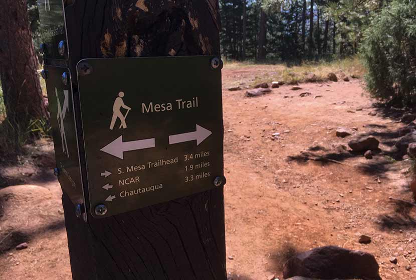 mesa trailhead sign below flatirons near boulder colorado