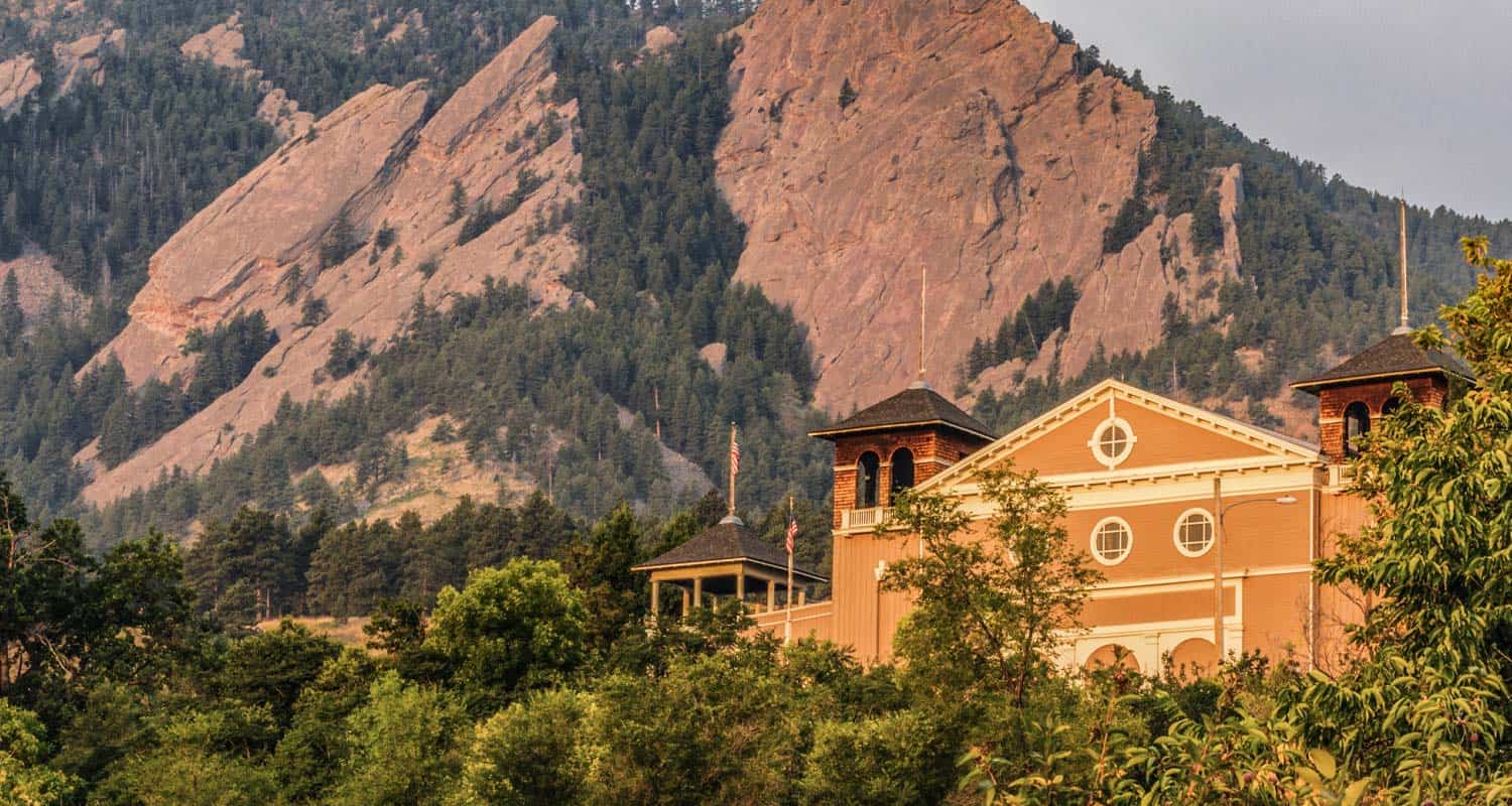 chautauqua auditorium historic landmark with flatirons mountains in the background