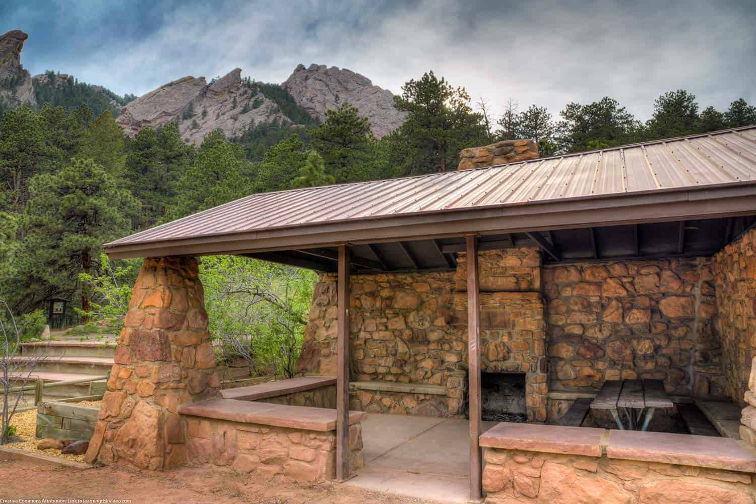 shelter along the bluebell road trail in chautauqua park boulder with flatirons in background