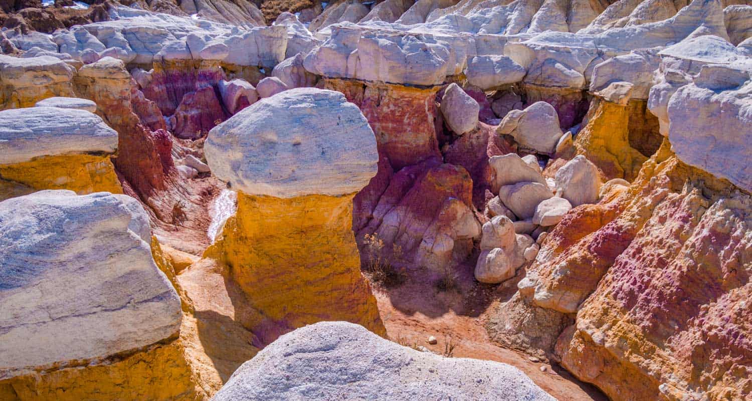 the deep gully of the paint mines on hike near colorado springs rainbow colored sandstone and hoodoo rock formation