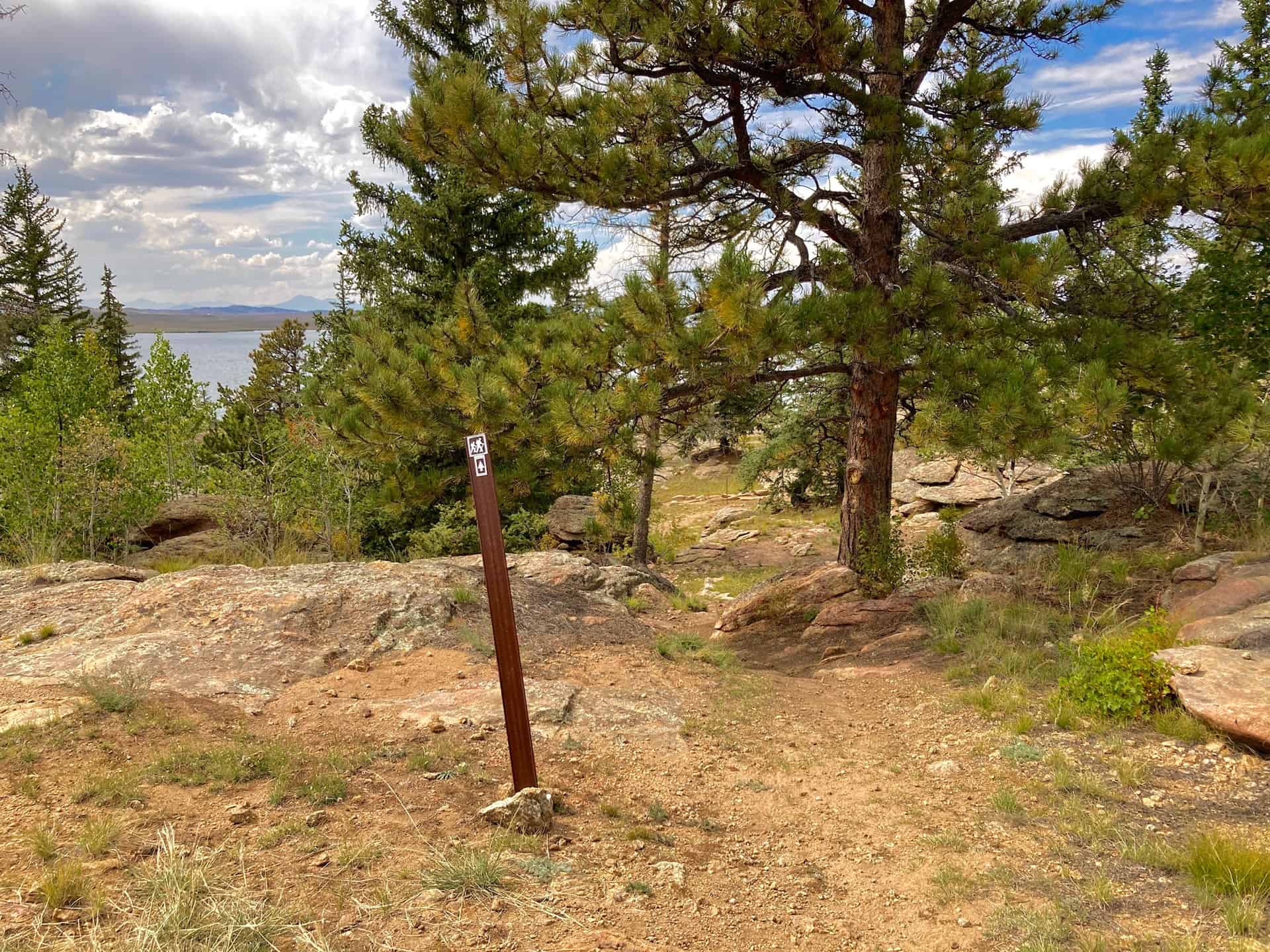 sign with hiker symbol